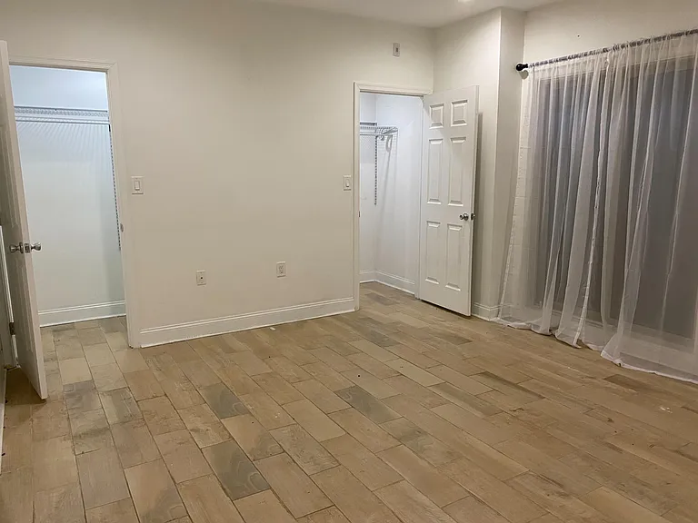 master bedroom with two separate closet
