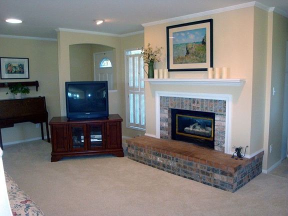 Main Lvl Living Room with Gas Fireplace for Cozy Evenings