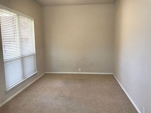 Front room that is perfect for a home office.