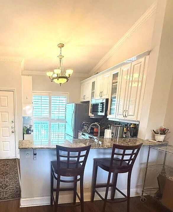 1st image of 2720 S Oakland Forest Drive #1210