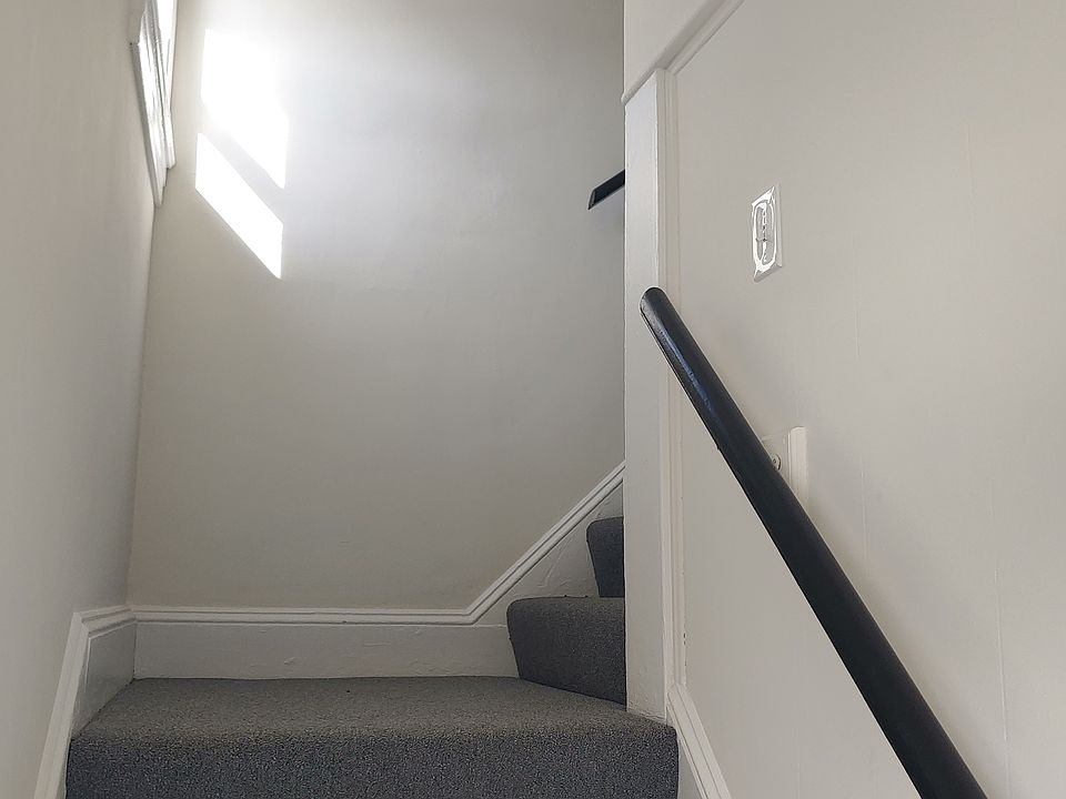 Stairs leading to 2nd floor unit