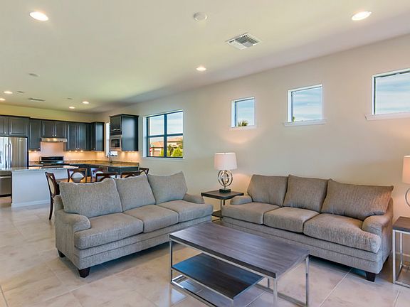 Gathering Room, open to the Dining and Kitchen, perfect for entertaining