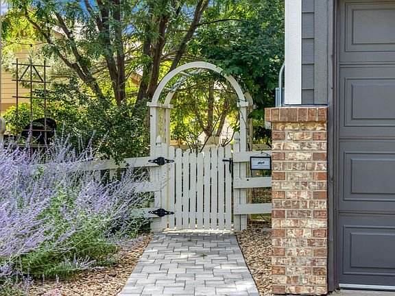 Side entry complete with twinkly lights on arched entry