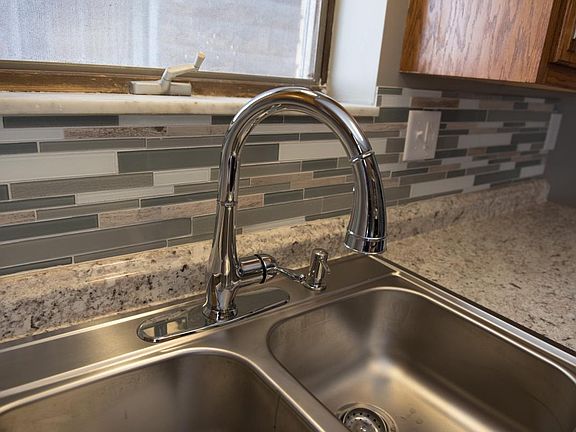 Stylish backsplash and fixtures