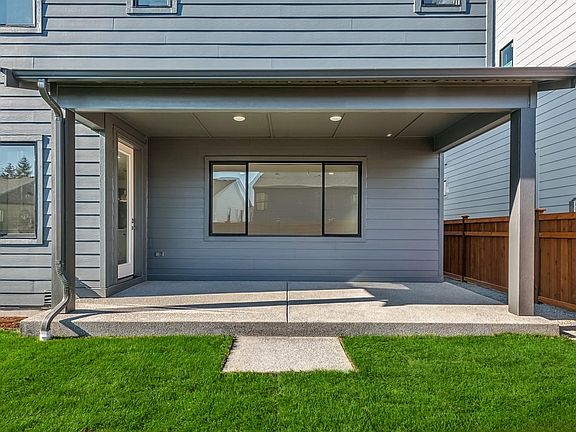 Covered Outdoor Living and Fenced Rear Yard