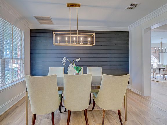 Elegant formal dining - open to family room and kitchen