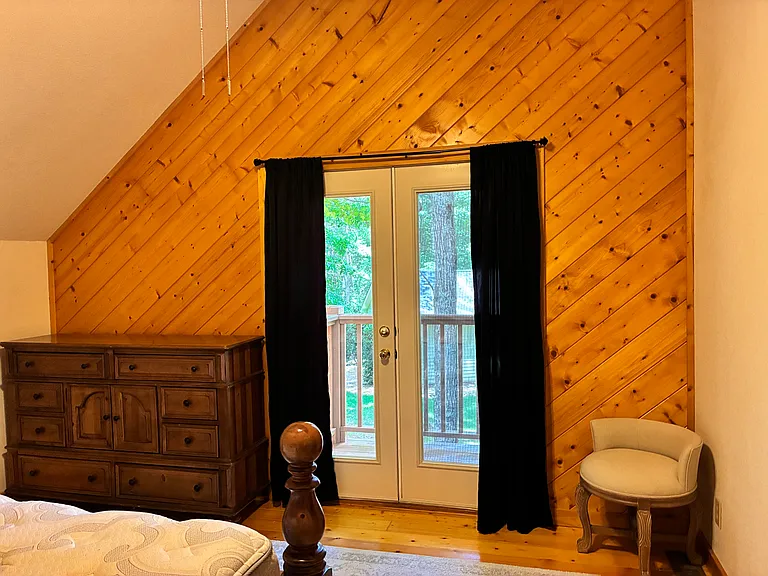 Upstairs bedroom and balcony