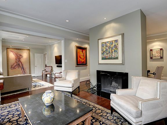 Living Room with wood-burning Fireplace