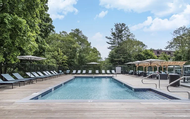 Sun-filled outdoor pool and lounge deck