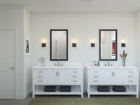 Primary bath with freestanding vanities