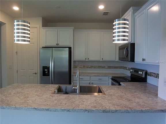 4th image of 8777 Tuscany Isles Dr