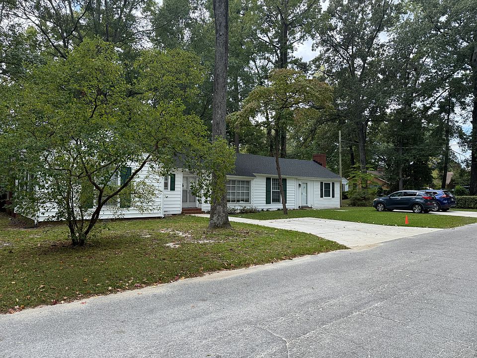 Front view of home and parking