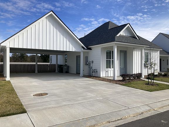 Exterior with 2 car covered carport