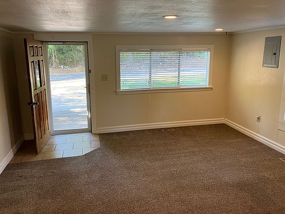 Front room with 3-panel bay window.