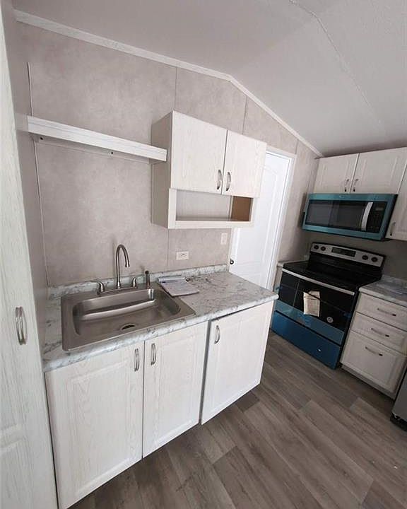 1st image of 2423 NE Palm Ave Lot 20