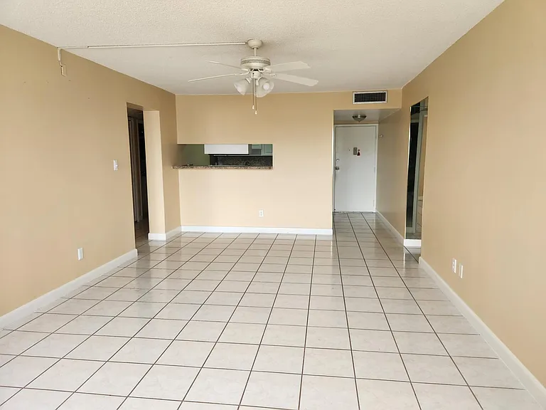 Living room, dining room, and breakfast bar.