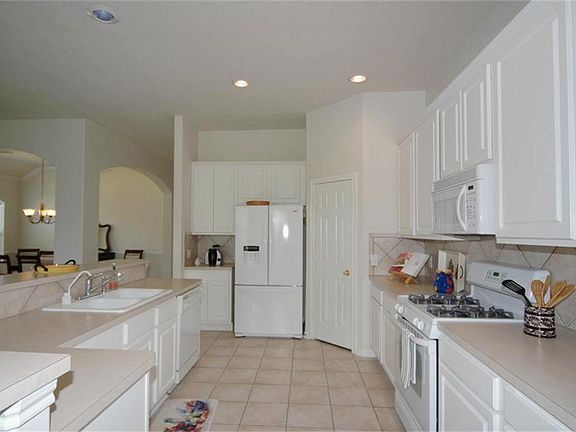 View of kitchn=en with the Formal dining in the background on the left.
