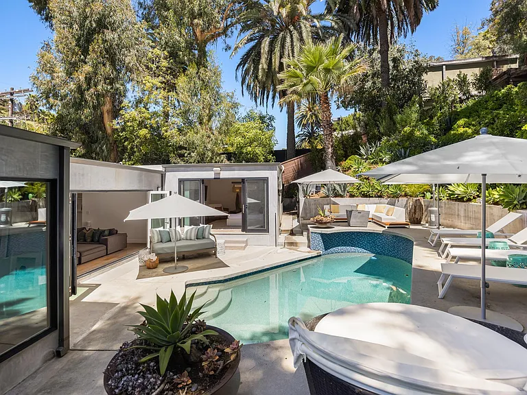 Abundant outdoor furniture, offering ample space for relaxation and enjoyment.