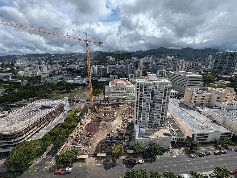 Straub is building a parking garage topping out at 20 floors. Punchbowl view remains intact.
