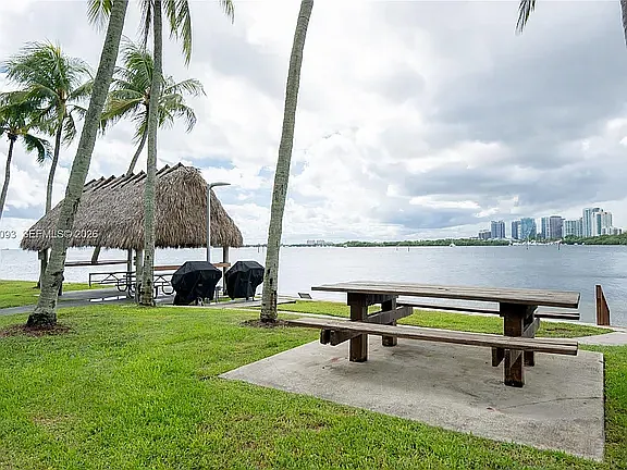 Tiki Hut, Private Beach, Kayak Storage, and multiple barbeque area
