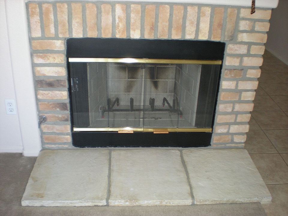 Wood burning fireplace can also accomodate a gas log set.