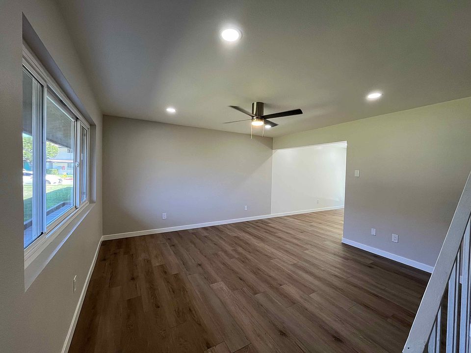 New vinyl laminate flooring and recessed lighting.