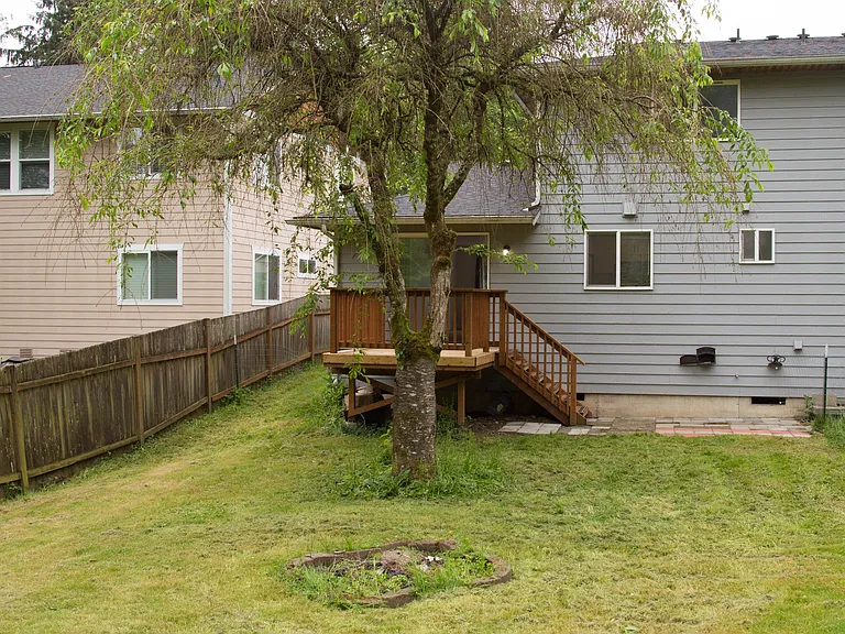 Large private backyard with peaceful outdoor space perfect for BBQs, relaxing, and entertaining. Quiet end-of-street setting.