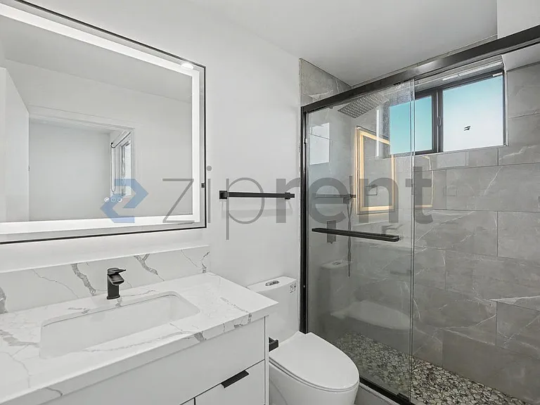 1438 W 37th Dr — Photo 12
