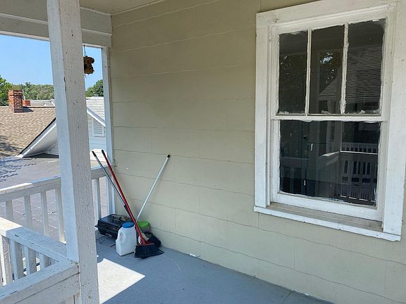 Small outside area located at the top of the stairs.