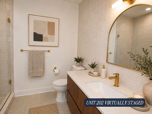 Unit 202 Virtually Staged Primary Bedroom
