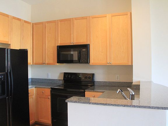 Open Kitchen w/Maple cabinet