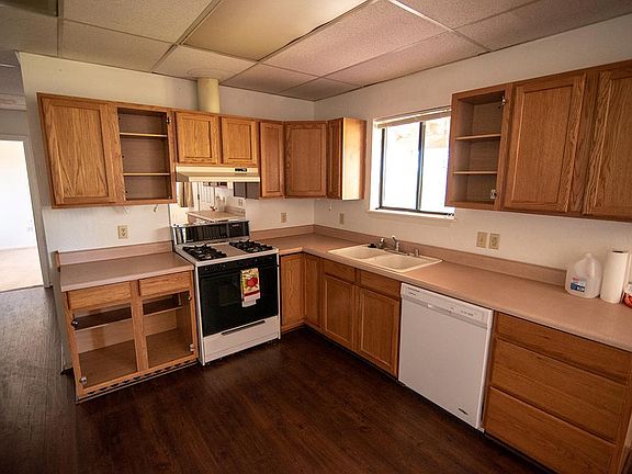 Kitchen (cabinet doors being repaired)