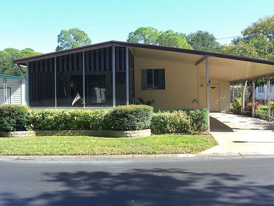Front of home and carport