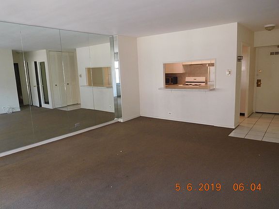 THE LIVING ROOM IS LARGE.  NOTICE THAT THE KITCHEN HAS AN OPEN VIEW TO THE LIVING ROOM. tHE ENTIRE W