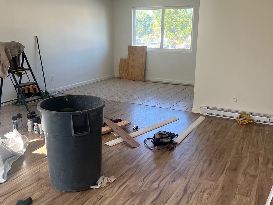 Walk through door and see living room and dining room.