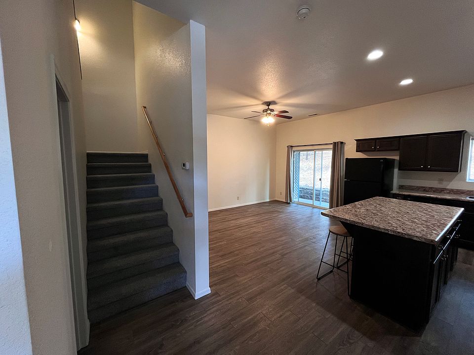 stairs to bedrooms/ kitchen & living area
