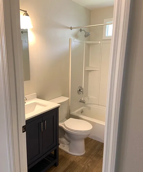 Bathroom with linen closet, good natural light