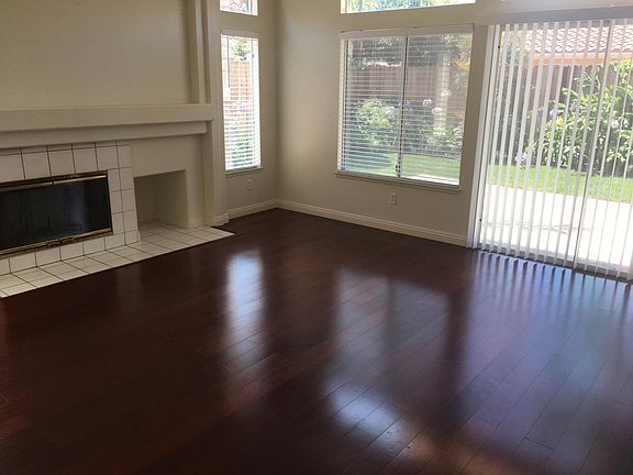 FAMILY ROOM WITH FIREPLACE/HARDWOOD FLOORS