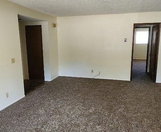 Large living room with tiled entry.
