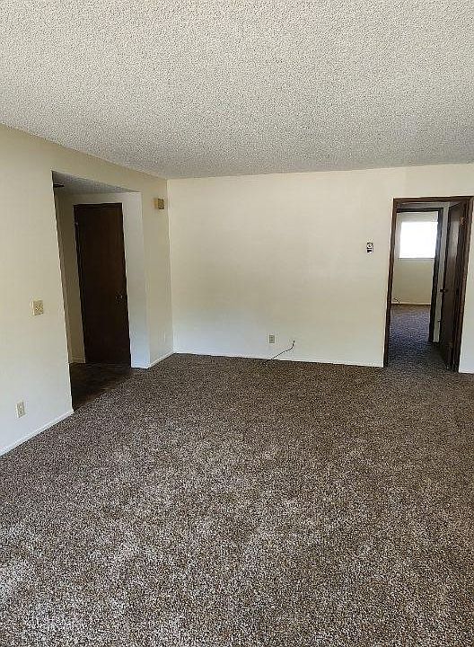 Large living room with tiled entry.