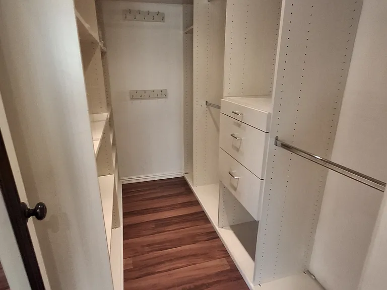 Walk in closet in master bedroom