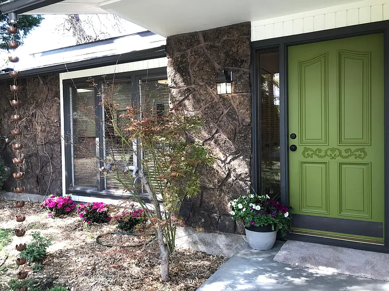 Front door. Window is to dining area.
