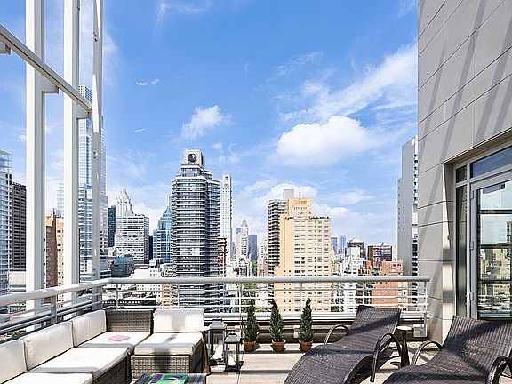 2nd image of 301 E 61st St #Penthouse
