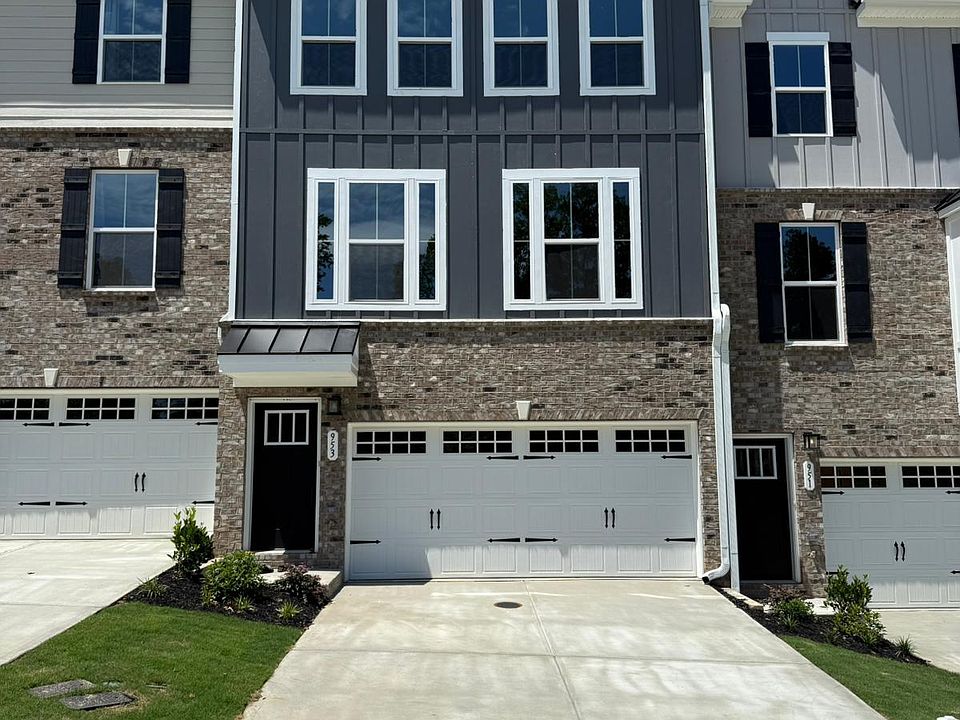 Front of the house, two car garage and an extended drive way