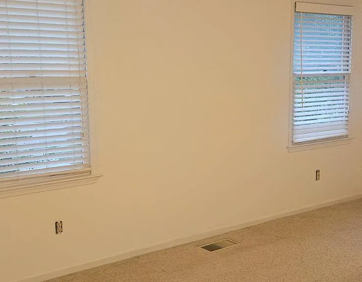 One of three spacious bedrooms