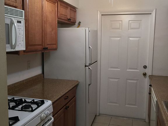 new kitchen cabinets and 2nd door to outside