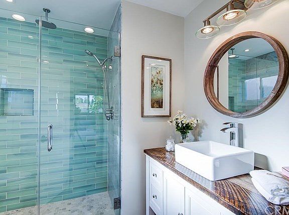 Completely remodeled master bathroom with expanded shower, all new plumbing and elegant vanity.