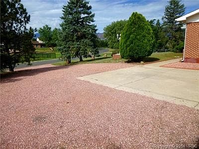 Plenty of parking adjacent to the 2 car garage