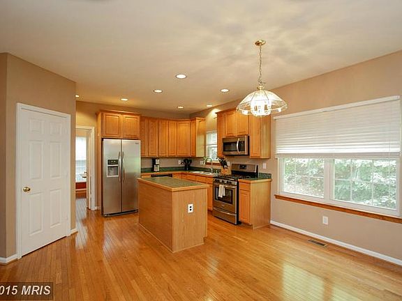 Kitchen with picture window and lots of light.
