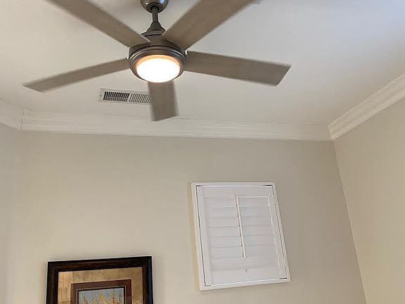 Casita fan above bedroom/living space.